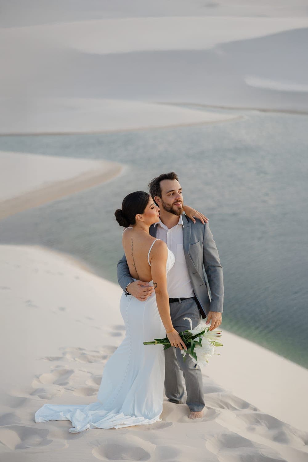 Mariana e Robson, caminhando de mãos dadas nas dunas, Santo Amaro, Lençóis Maranhenses
