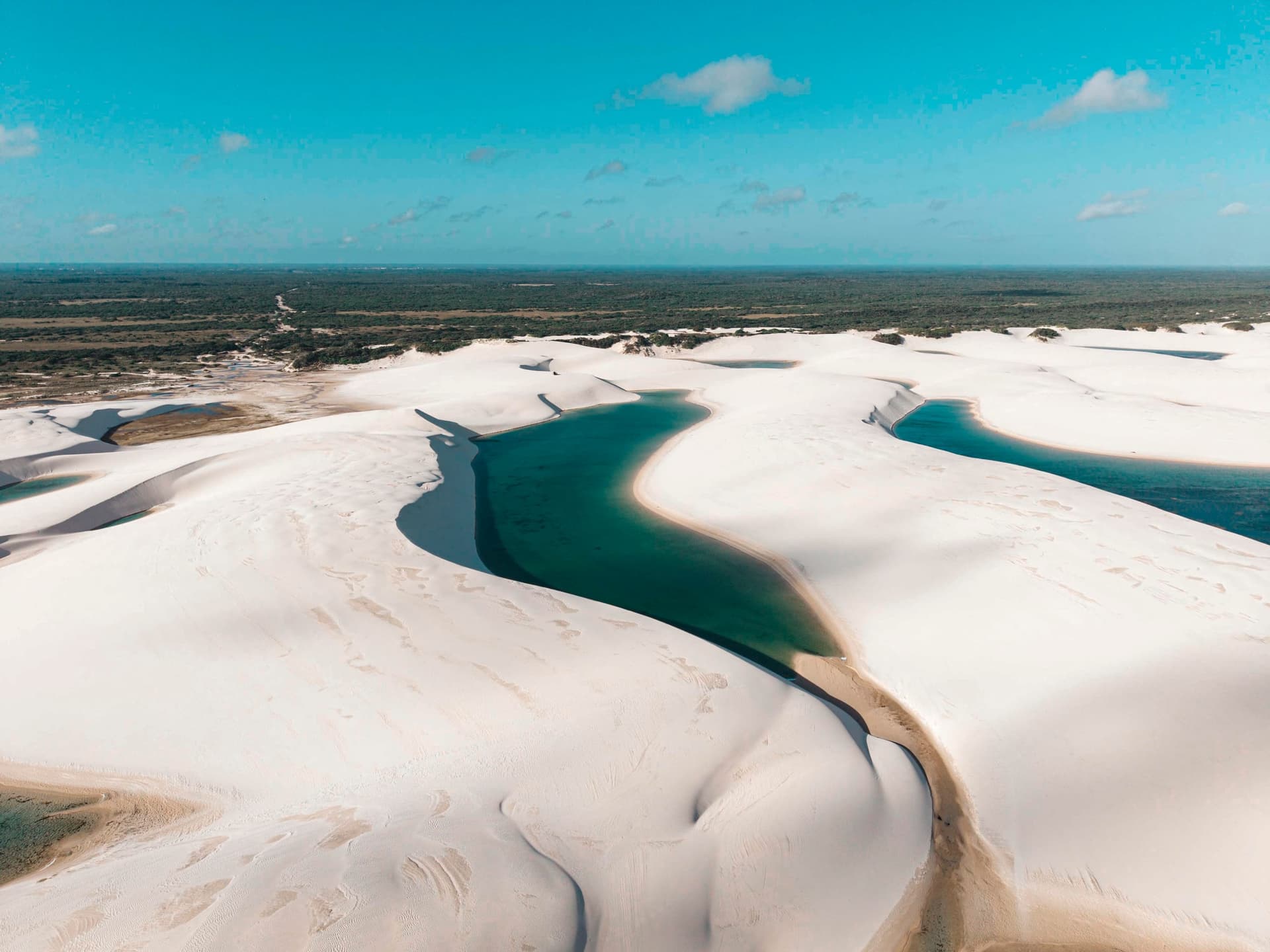 Green lagoons winding between the dunes in the Lagoa Bonita region